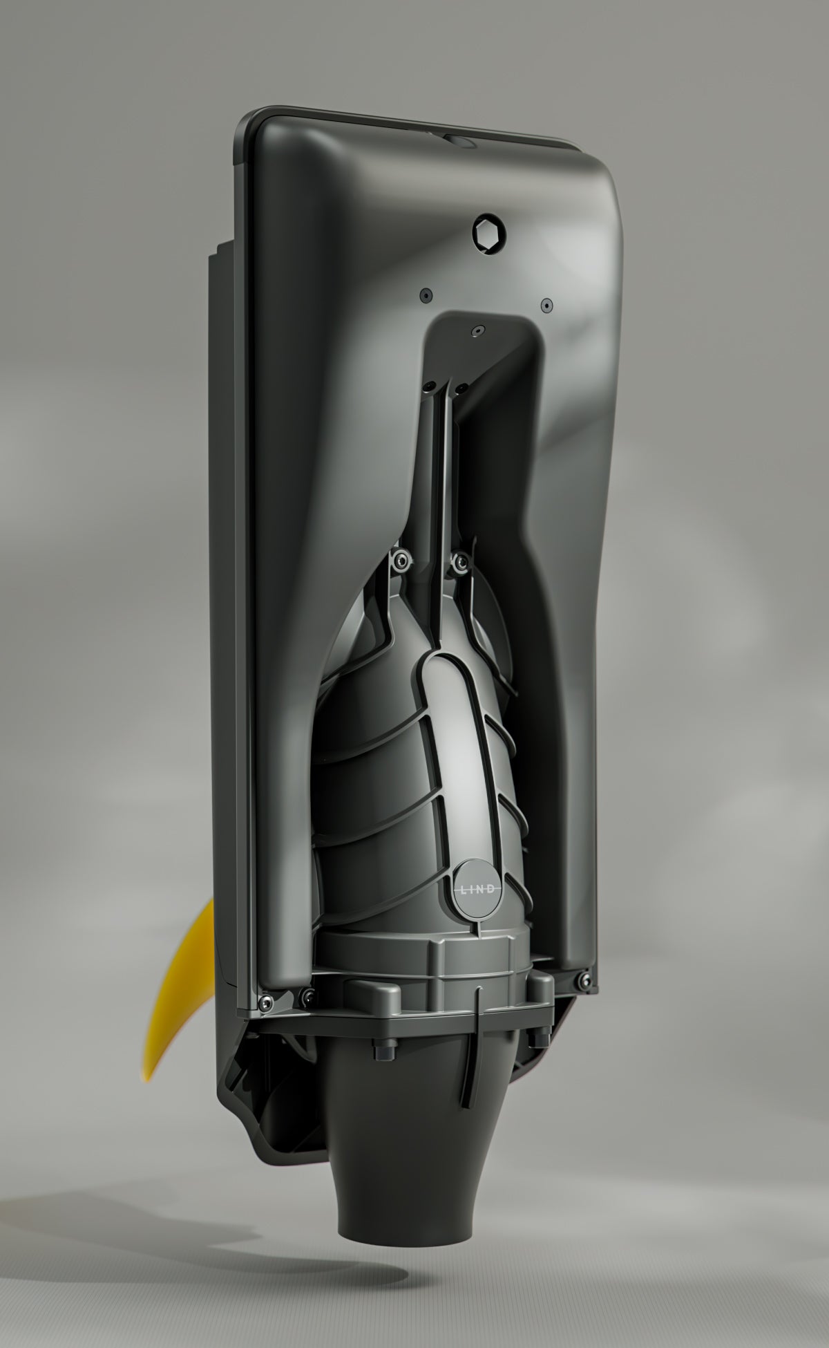 A black motor for the LIND Canvas electric surfboard with a yellow fin.