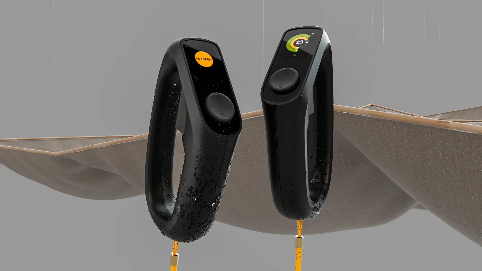 Two controllers in black with water drops facing each other from the side.